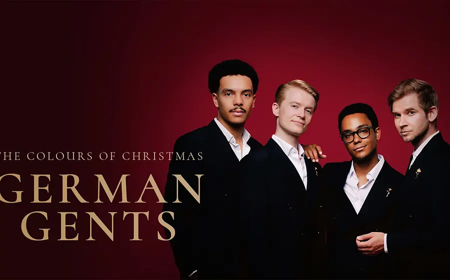 German Gents, The Colours of Christmas: Vier Sänger in schwarzen Anzügen vor rotem Hintergrund mit Titeltext.
